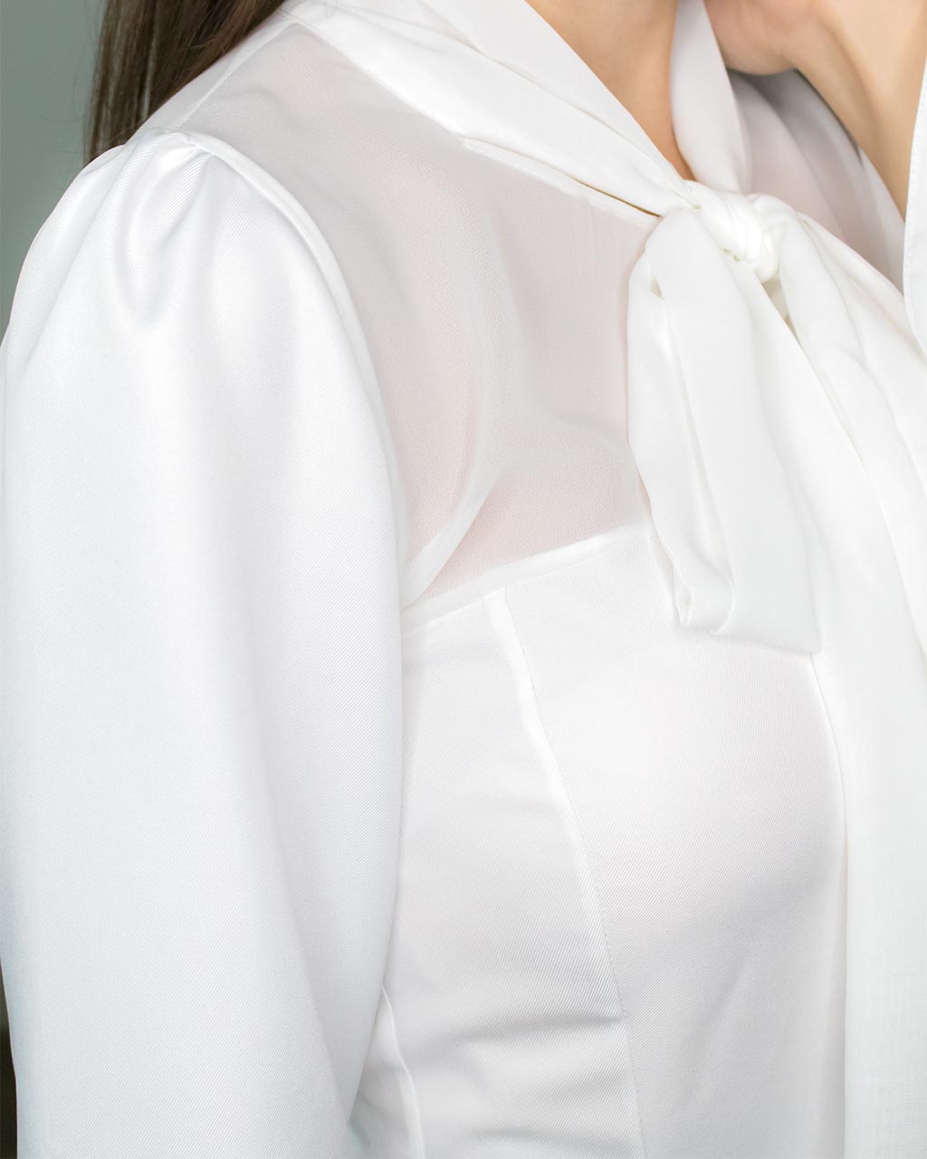 Classy elegant shoulder detail of white party going out office work peplum blouse by ADKN made from recycled PET bottles