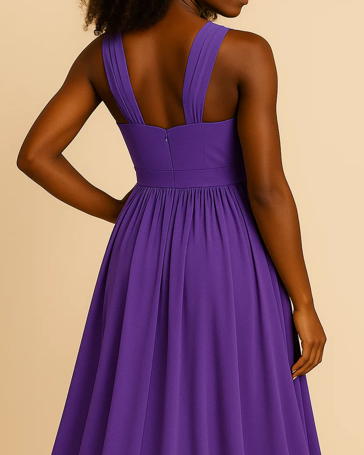 The Arabella bandeau evening gown in purple, made from sustainable recycled polyester. Shown from the back view. Ethically made in London by ADKN