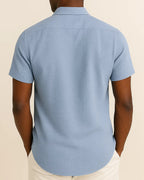Rear view of blue linen blend shirt – men’s summer short sleeve shirt