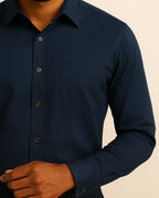 Close-up of navy men’s shirt fabric – soft bamboo blend and button detail from Elston Midnight range