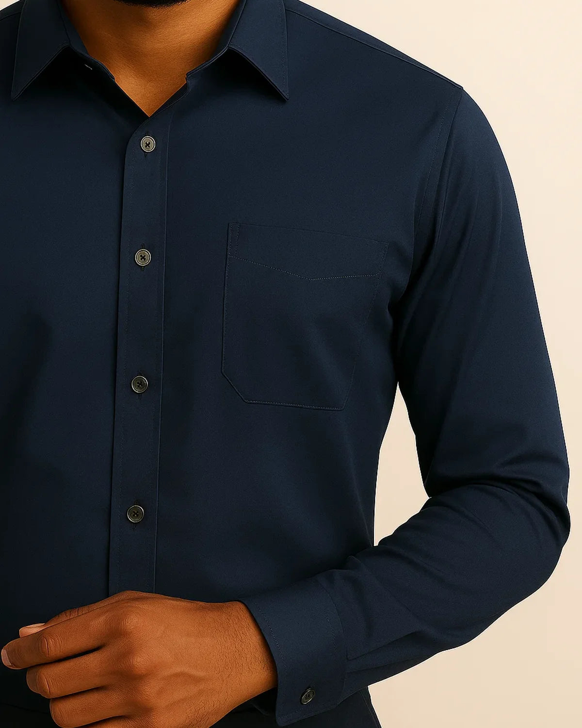 Close-up of navy men’s shirt fabric – soft bamboo blend and button detail from Elston Midnight range