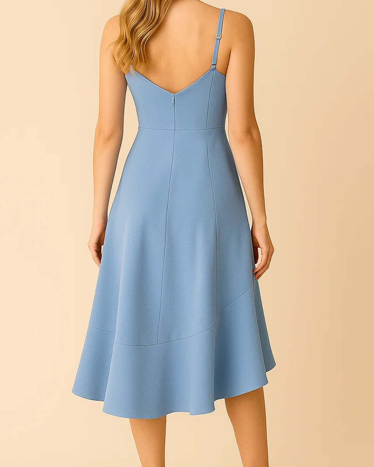 Back design of ADKN’s sustainable ruffle midi dress in pastel blue recycled fabric.