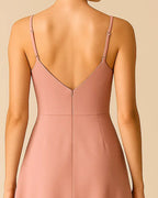 Back of ADKN’s sustainable Elysian midi dress, featuring detailing and zip closure.