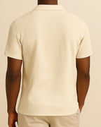 Rear view of cream short sleeve men’s shirt – ribbed texture, soft drape