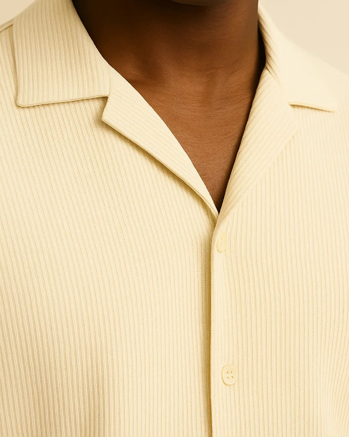 Close-up of ribbed knit fabric in cream – recycled polyester texture