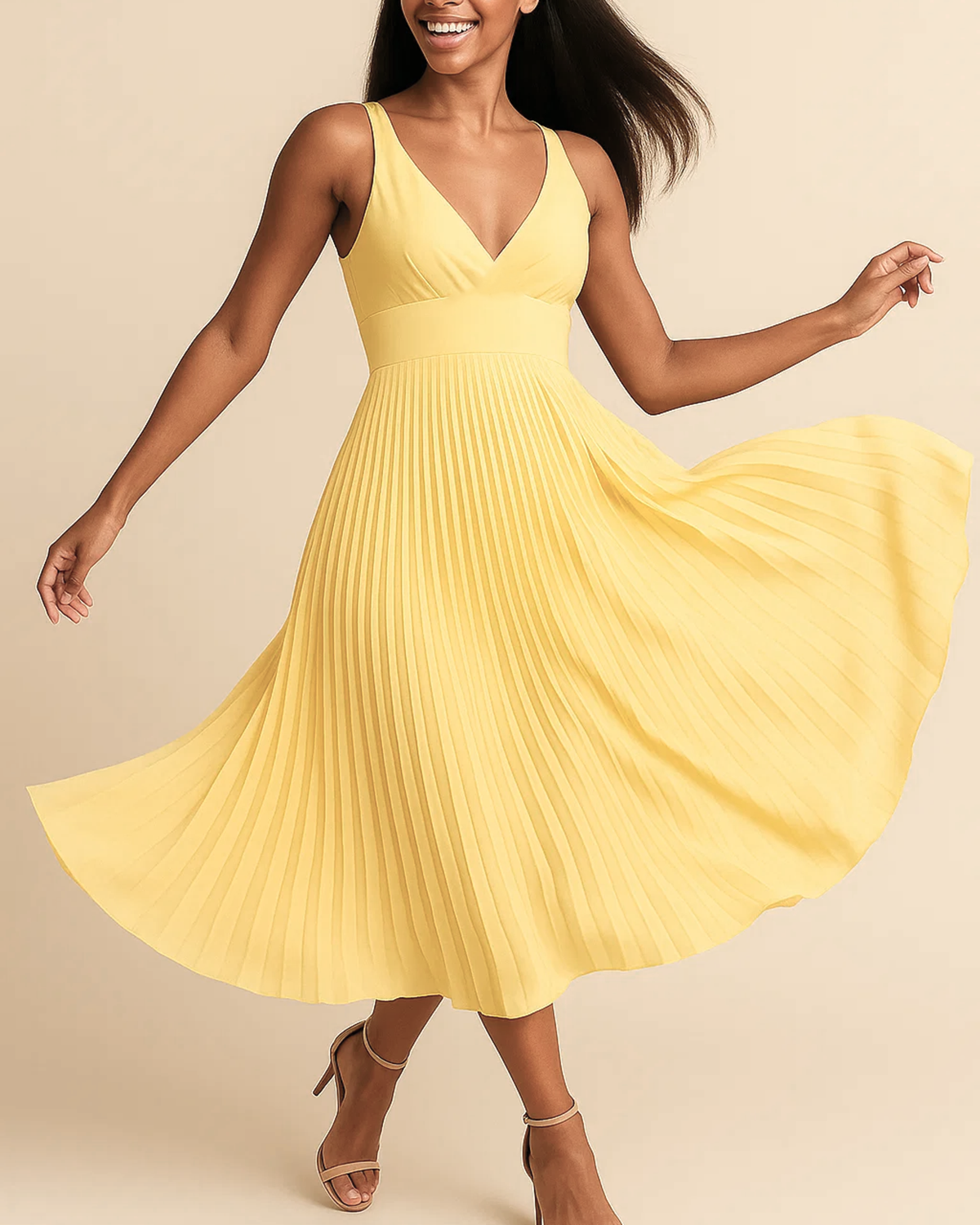 The Soleil pleated midi dress in butter yellow, made from sustainable recycled polyester. Shown from the front view. Ethically made in London by ADKN