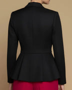 Kleitos Sustainable Black Peplum Blazer: RPET Newlife Eco-Luxury with Corozo Buttons