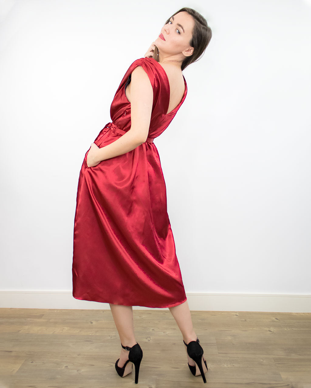 Sustainable ethical satin silk red wrap ruched dress for formal cocktail party or wedding with belt made from recycled PET