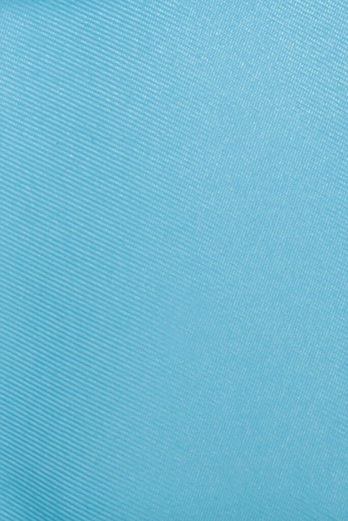 Sustainable pastel blue gabardine made from recycled plastic bottles for Abel Dress by ADKN