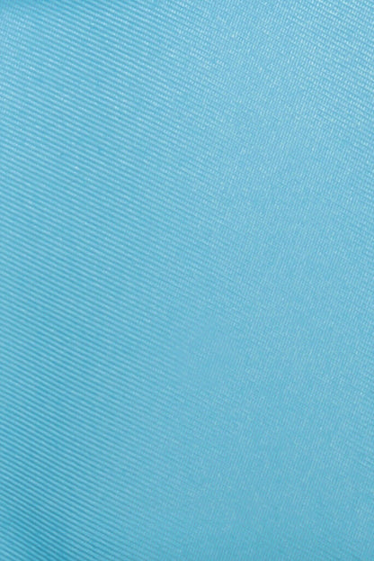 Sustainable pastel blue gabardine made from recycled plastic bottles for Abel Dress by ADKN