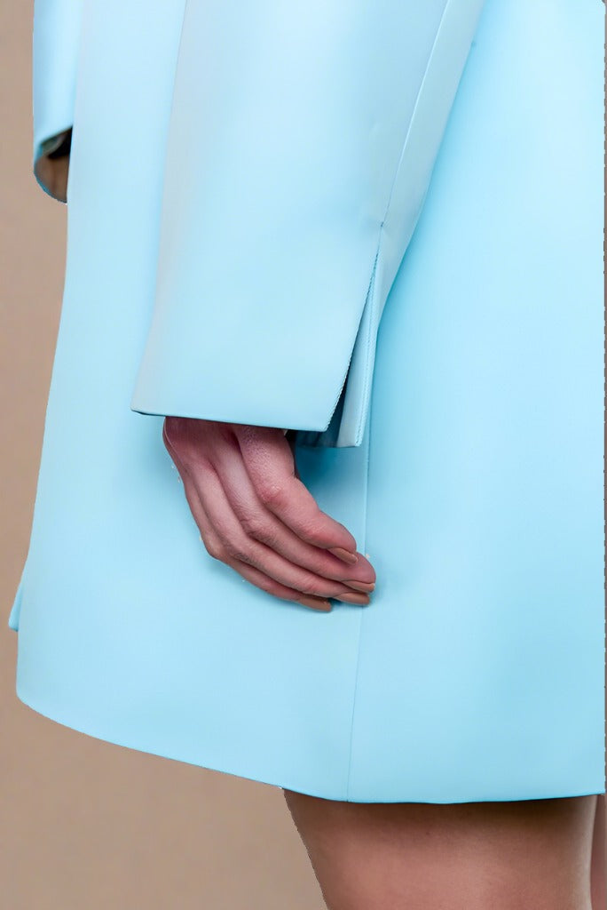 Pale blue sustainable gabardine Cardea Coat by ADKN sleeve detail
