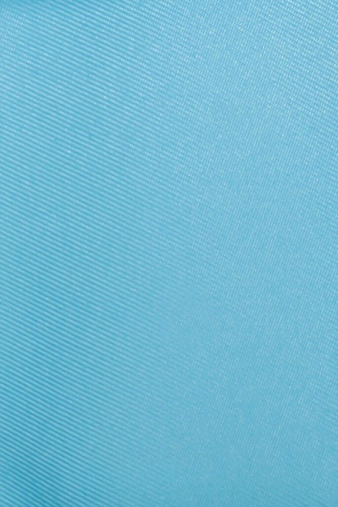 ADKN Cardea Coat pastel light blue gabardine fabric from recycled plastic bottles RPET