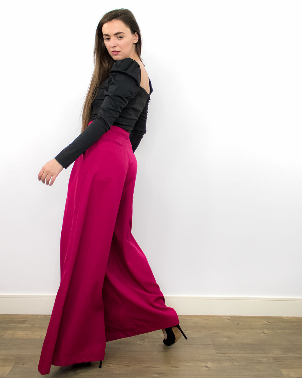 Ethical tailored wide leg smart work or evening party sustainable red high waist trousers from recycled PET ADKN made in UK