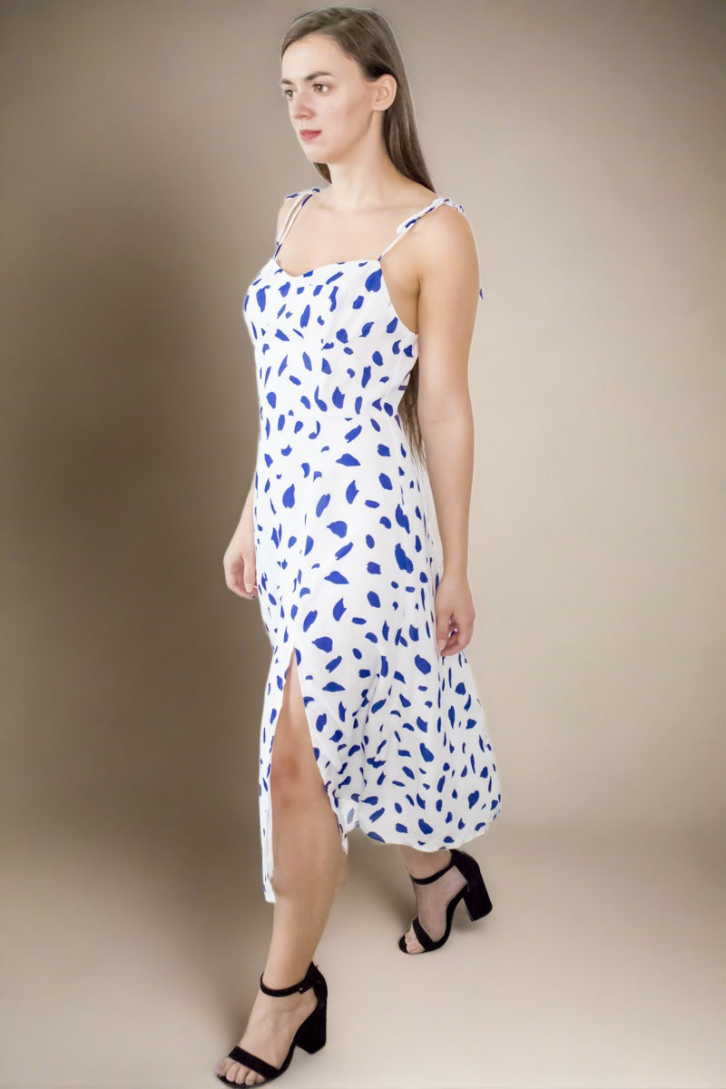 Sustainable upcycled summer party white polka dot midi dress with sweetheart neck tie straps and thigh slit by ADKN DLife UK