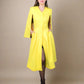 Yellow waterproof cape Raincoat stylish jacket women's ADKN with designer satin lining made in UK from sustainable materials