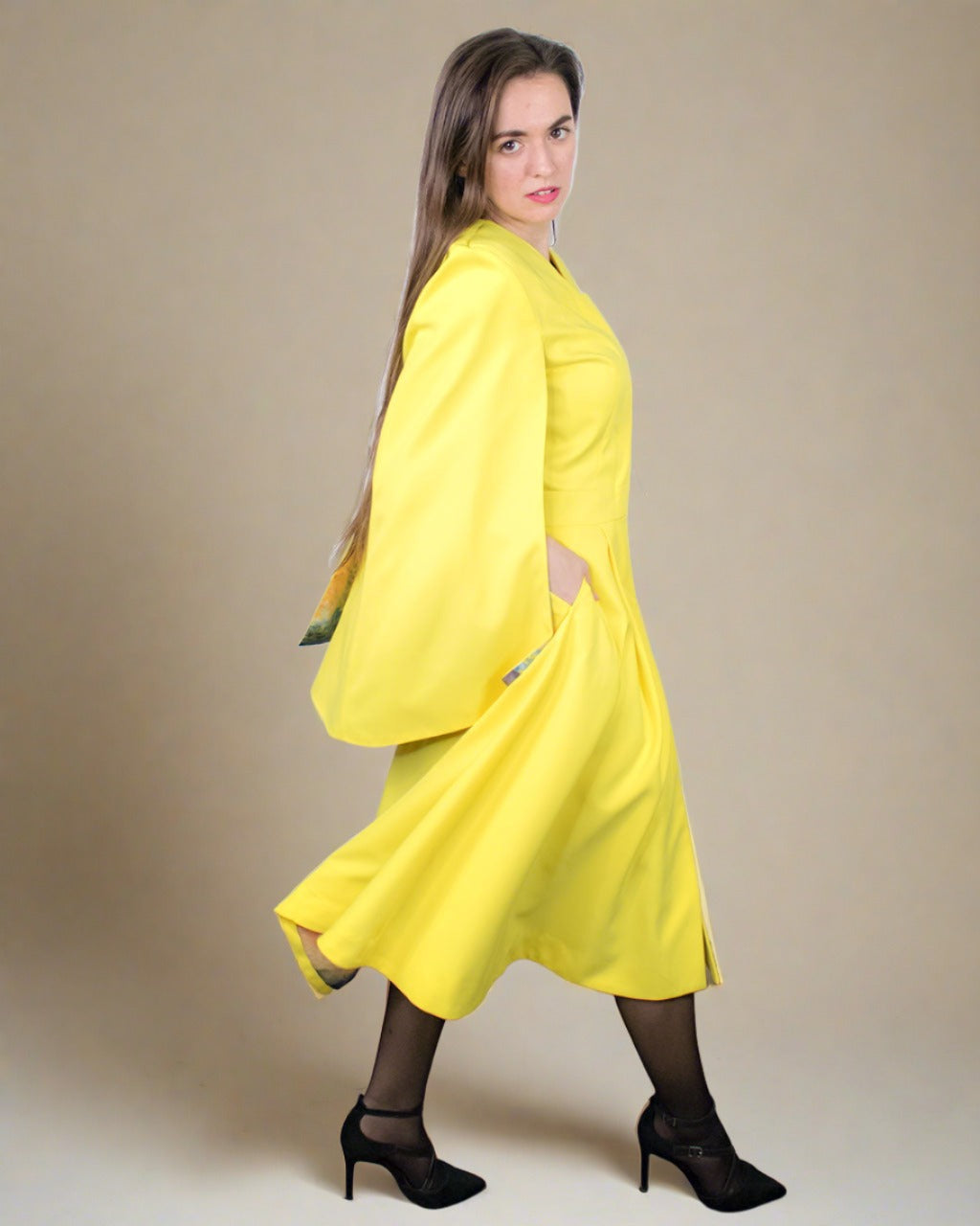 Waterproof yellow raincoat side view