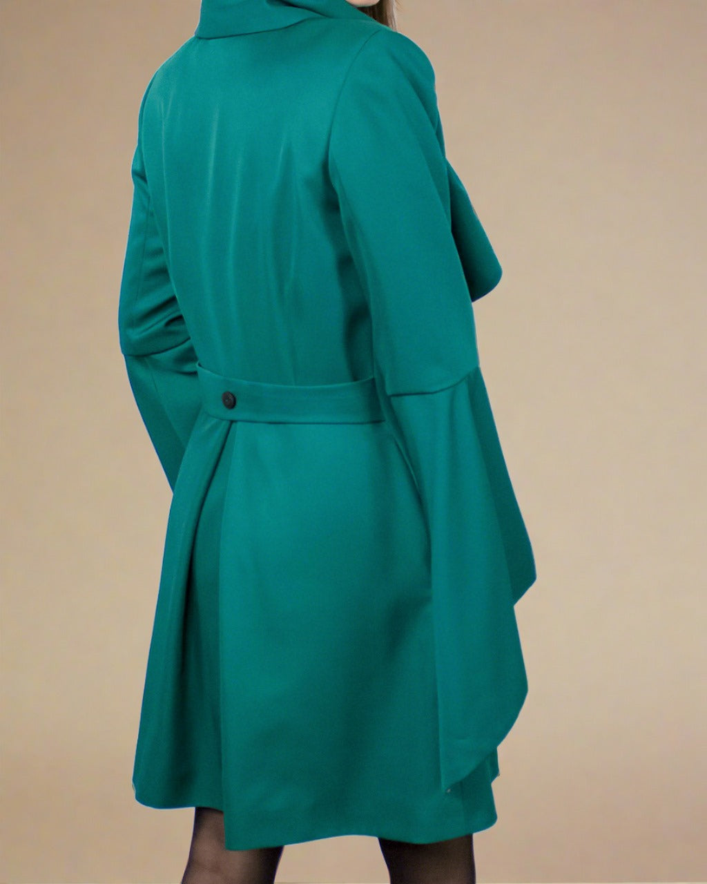 Back view of sustainable recycled forest dark green women's fit & flare classic spring coat jacket with bell sleeves and belt